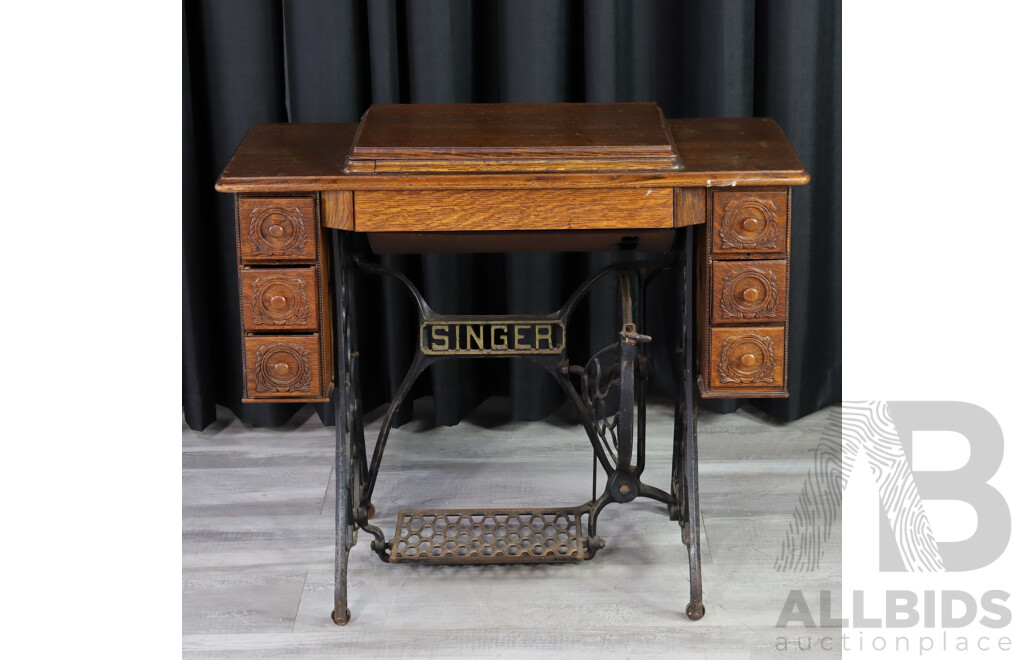 Singer Treadle Base Sewing Machine in Cabinet