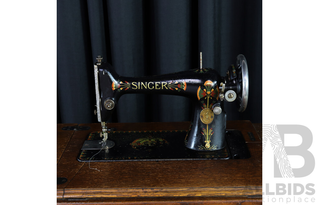 Singer Treadle Base Sewing Machine in Cabinet