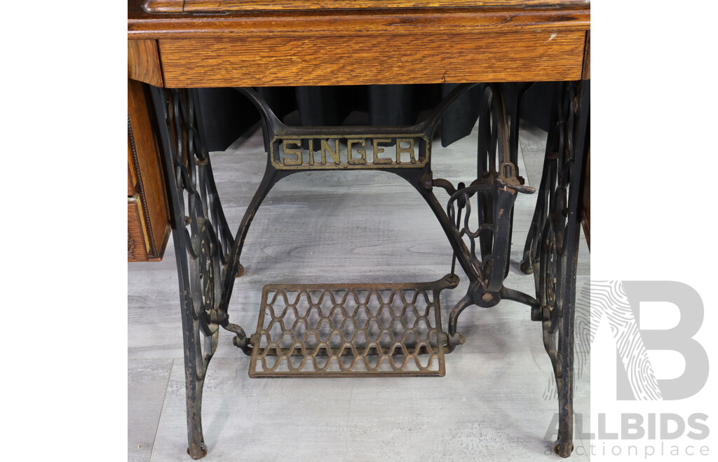 Singer Treadle Base Sewing Machine in Cabinet