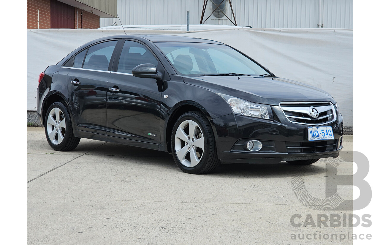 12/2010 Holden Cruze CDX JG 4d Sedan Black 2.0L