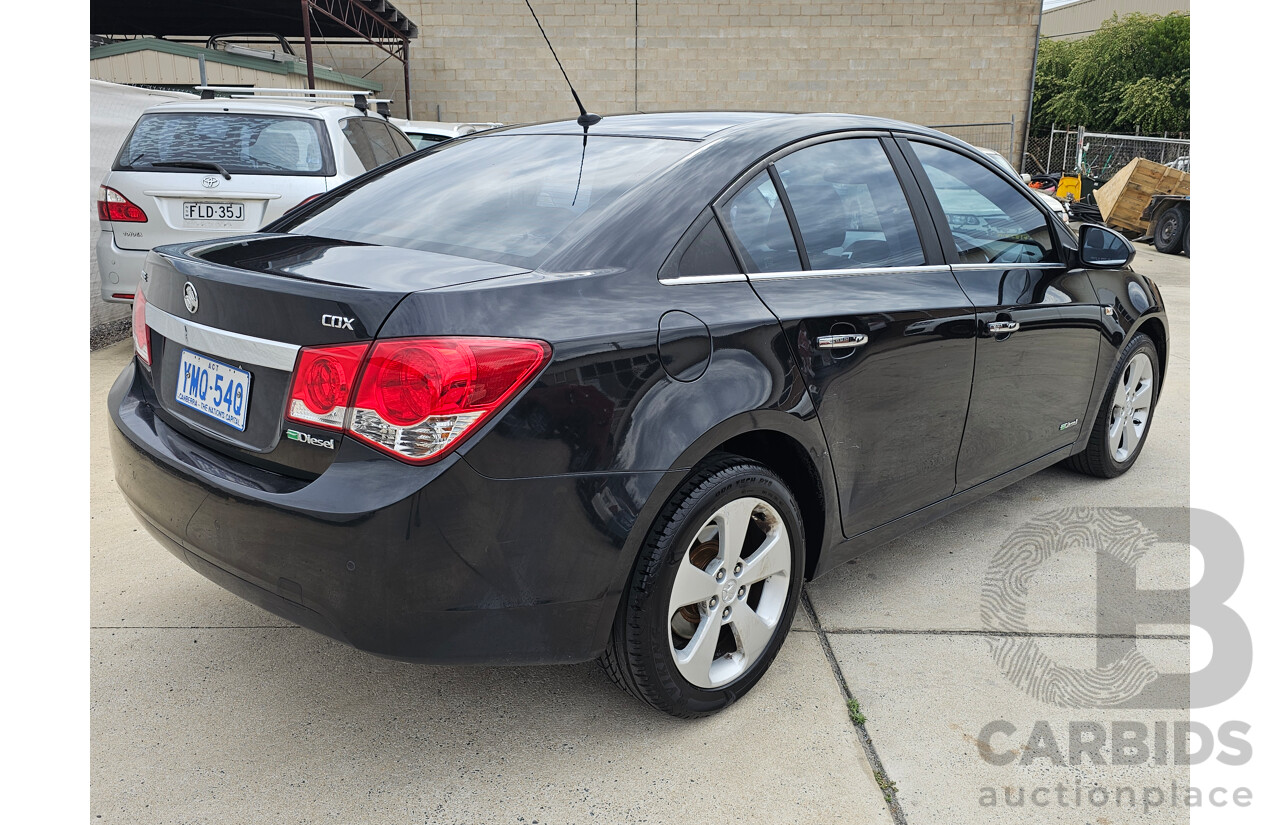 12/2010 Holden Cruze CDX JG 4d Sedan Black 2.0L