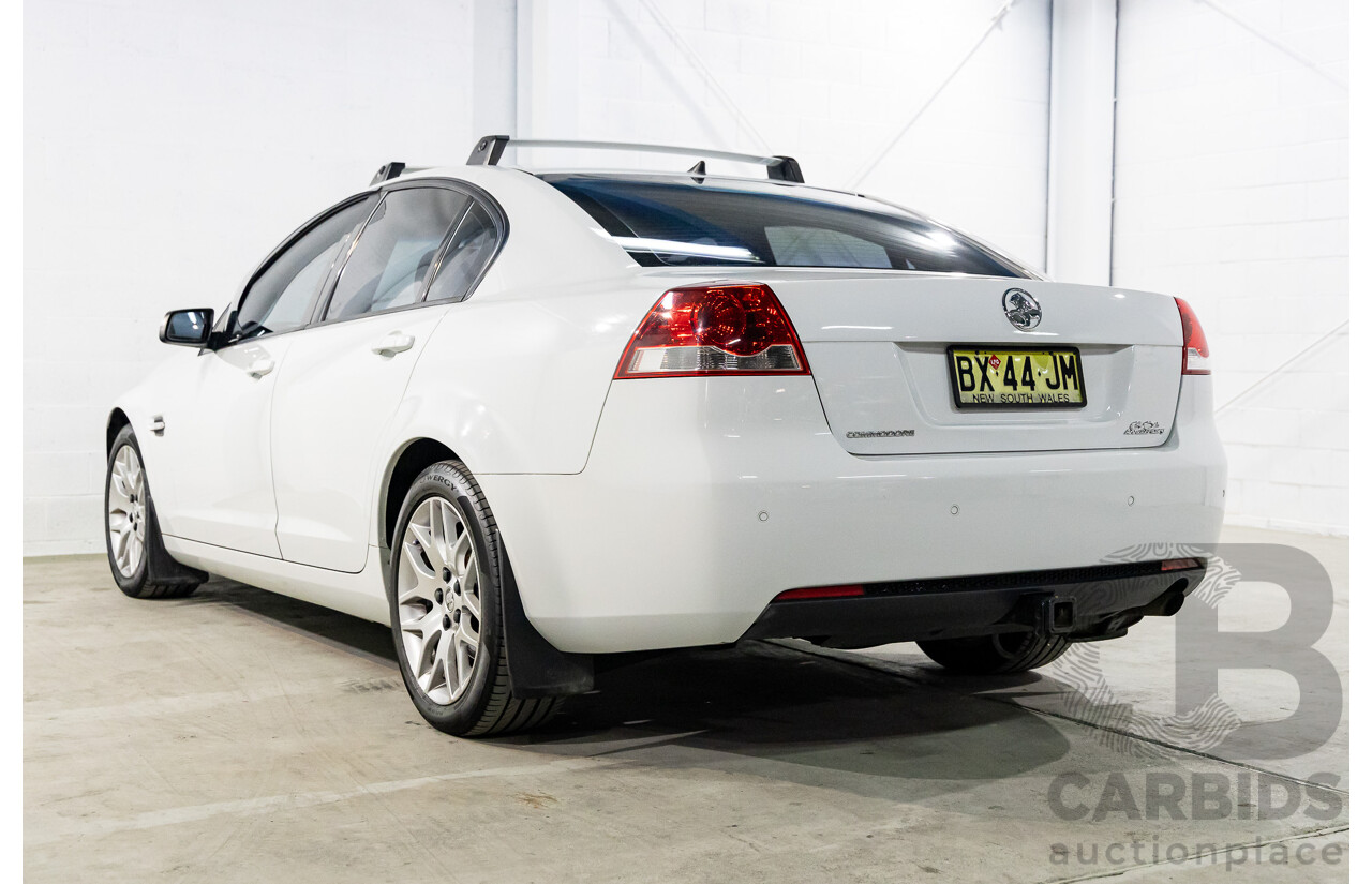 8/2008 Holden Commodore Omega (Dual Fuel) 60th Anniversary VE MY09.5 4d Sedan Heron White V6 3.6L