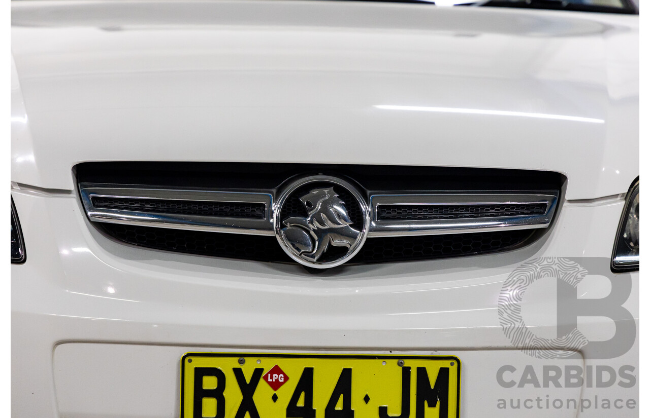 8/2008 Holden Commodore Omega (Dual Fuel) 60th Anniversary VE MY09.5 4d Sedan Heron White V6 3.6L