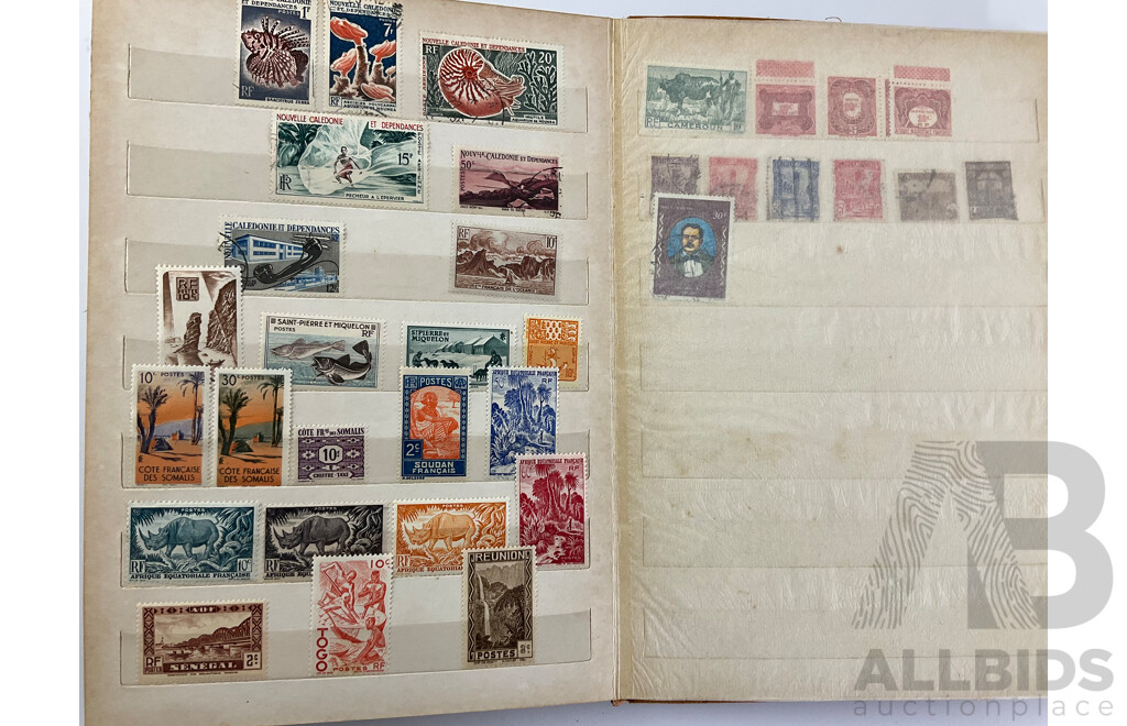 Two Albums of International Antique and Vintage Stamps Including Austria, Belgium, Barbados, British Guiana, Egypt, Fiji, Czechoslovakia, France, Germany and More