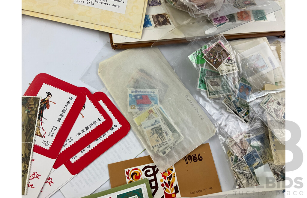 Collection of Vintage International Stamps Including Republic of China 1985 Album, First Day Covers and 1983 PNC, Isreal, Poland, Japan, Jamaica, New Zealand and More