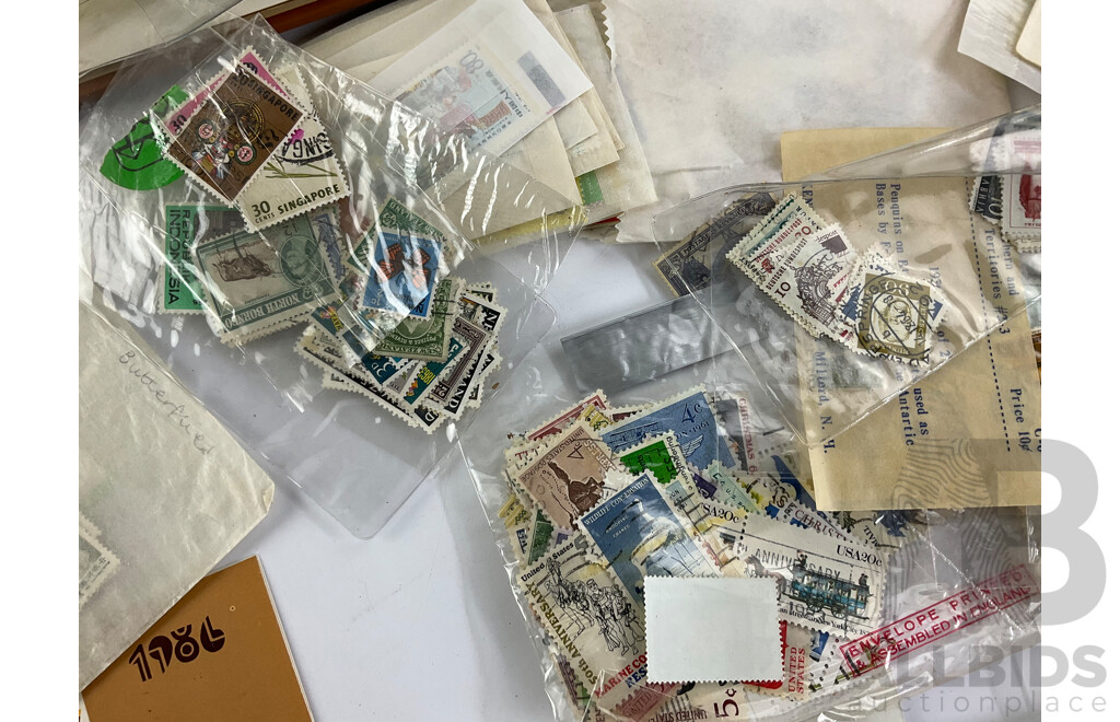 Collection of Vintage International Stamps Including Republic of China 1985 Album, First Day Covers and 1983 PNC, Isreal, Poland, Japan, Jamaica, New Zealand and More