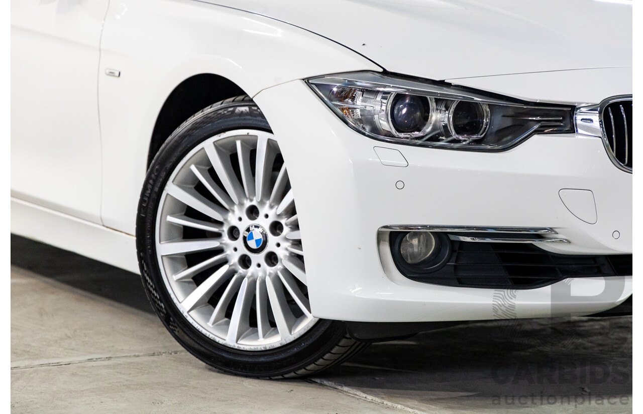 2/2014 BMW 320i Luxury F30 MY14 4d Sedan Alpine White Turbo 2.0L