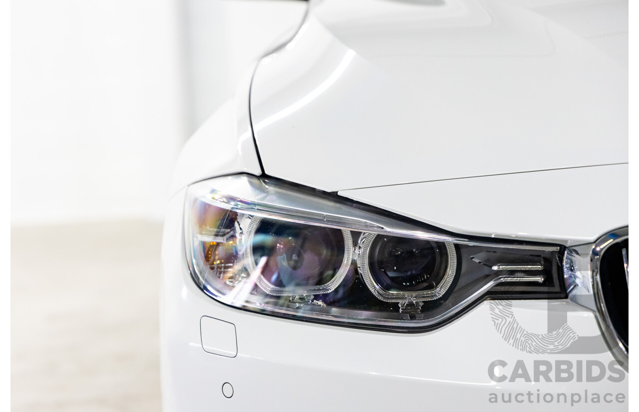 2/2014 BMW 320i Luxury F30 MY14 4d Sedan Alpine White Turbo 2.0L