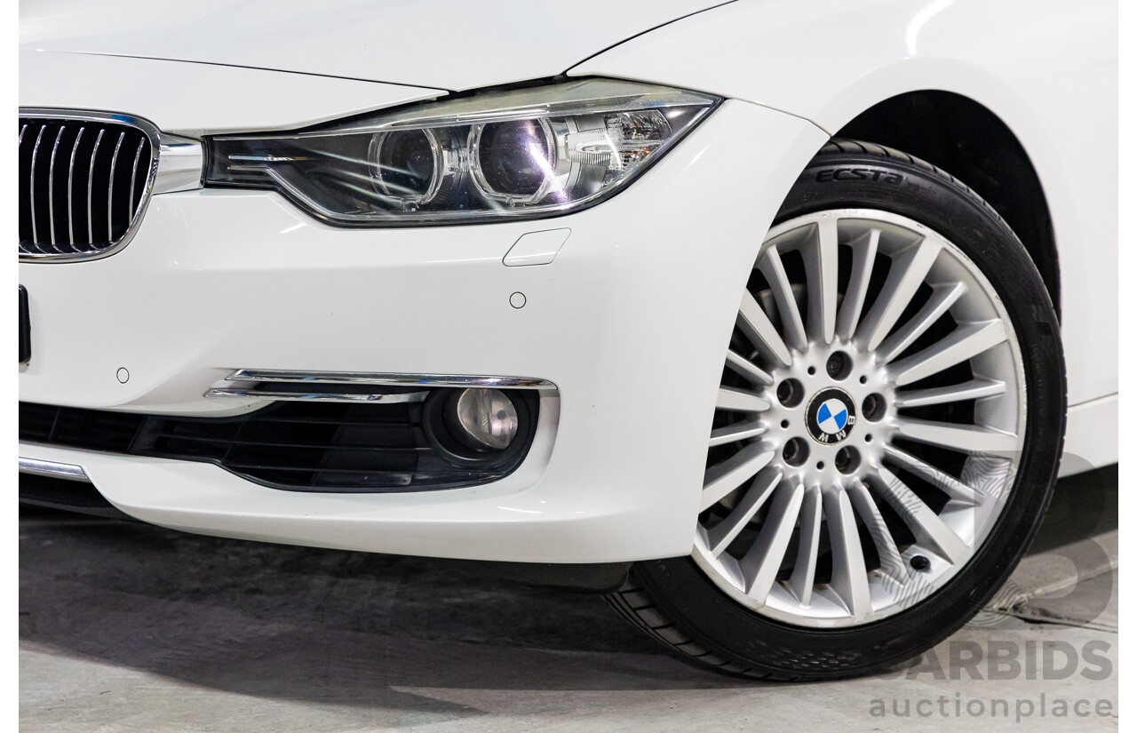 2/2014 BMW 320i Luxury F30 MY14 4d Sedan Alpine White Turbo 2.0L