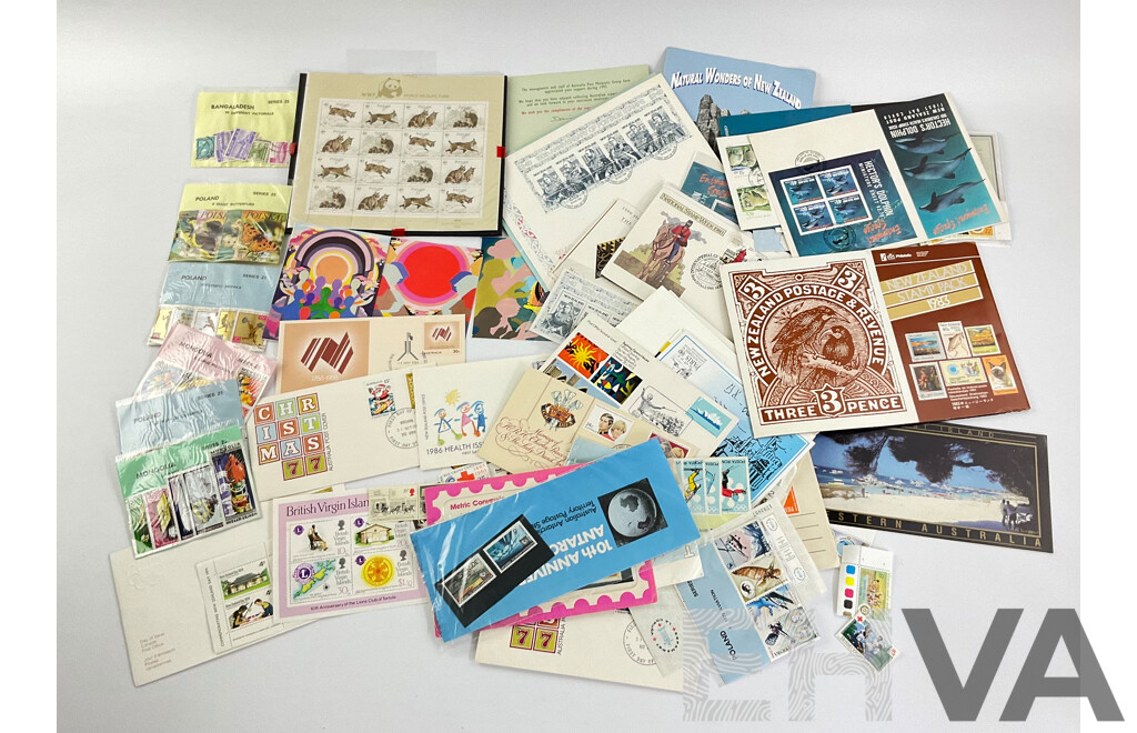 Collection of International Stamp Packs and First Day Covers Including Australia, New Zealand, Rhodesia, Poland and More