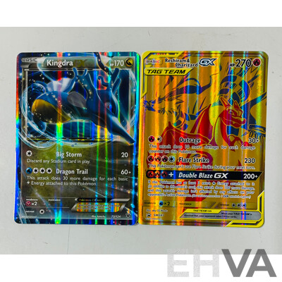 Collection of Oversized and Foil Pokemon TCG Cards Including Pikachu Vmax, Morpeko Vunion, Oversized Reshiram and Charizard Tag Team GX, Oversized Kingdra EX and Much More