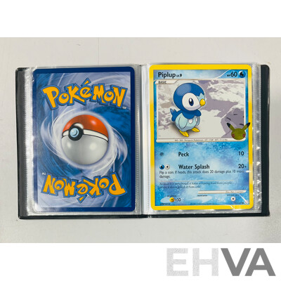 Collection of Oversized and Foil Pokemon TCG Cards Including Pikachu Vmax, Morpeko Vunion, Oversized Reshiram and Charizard Tag Team GX, Oversized Kingdra EX and Much More