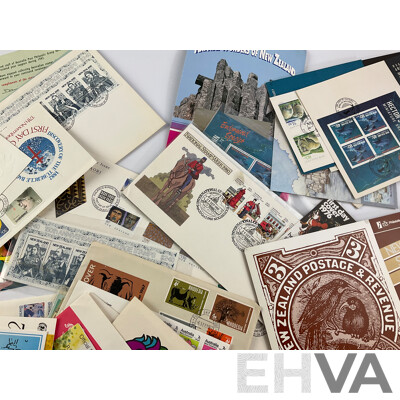 Collection of International Stamp Packs and First Day Covers Including Australia, New Zealand, Rhodesia, Poland and More