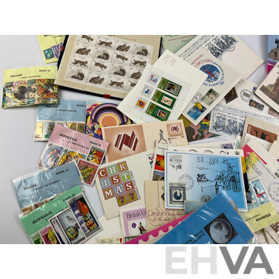 Collection of International Stamp Packs and First Day Covers Including Australia, New Zealand, Rhodesia, Poland and More