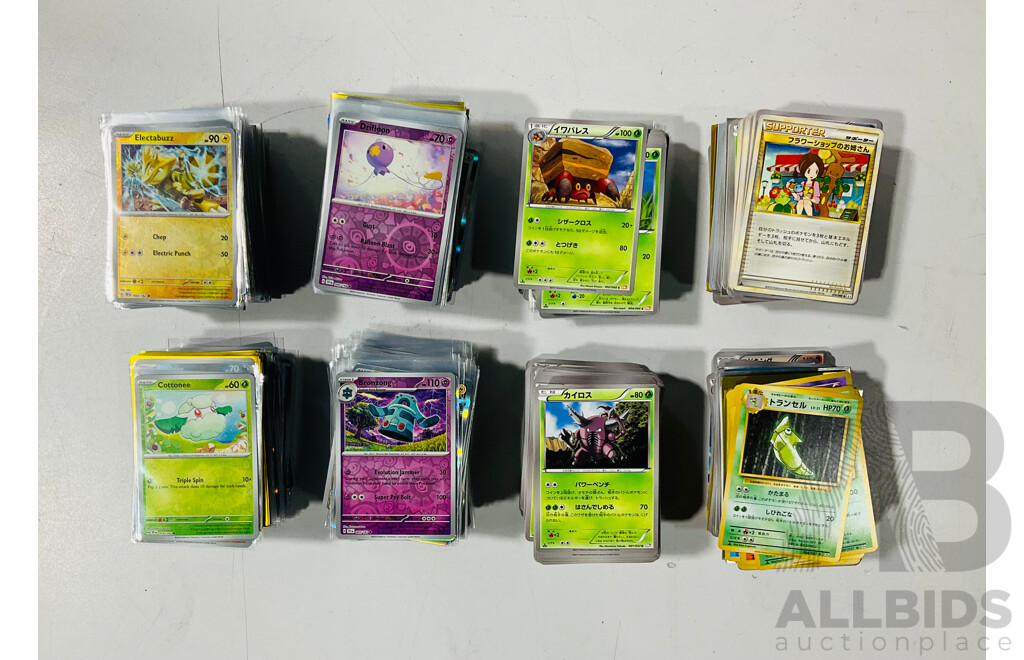 Collection of Pokemon TCG Cards Including Japanese and Holographic Foil Cards Stored in Three Paldean Fates Bundle Boxes