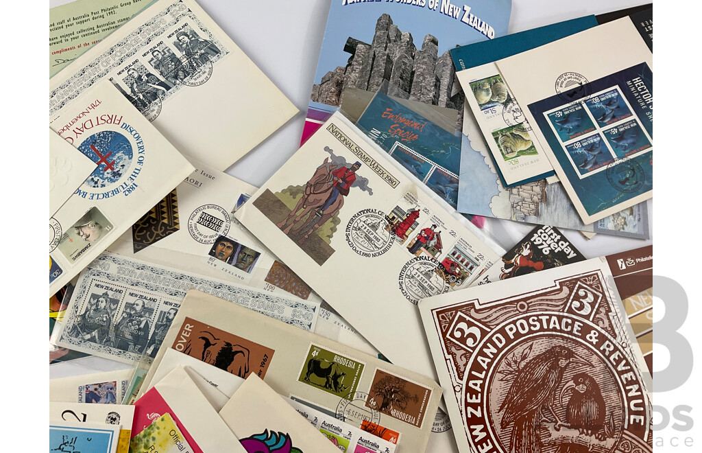 Collection of International Stamp Packs and First Day Covers Including Australia, New Zealand, Rhodesia, Poland and More