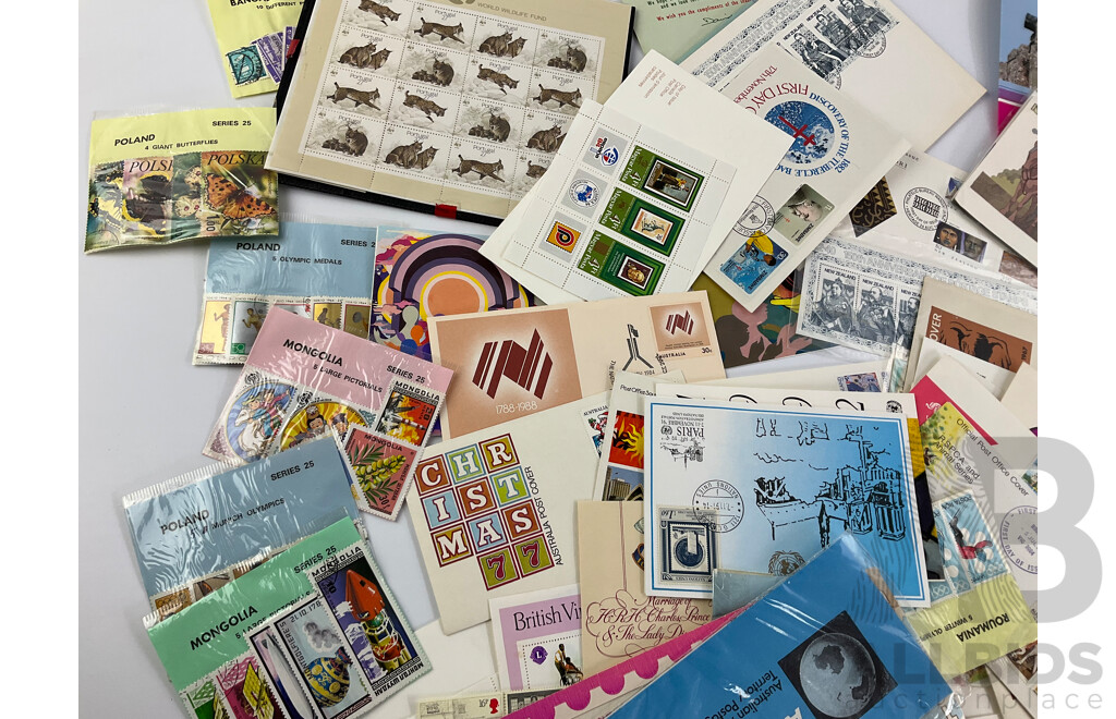 Collection of International Stamp Packs and First Day Covers Including Australia, New Zealand, Rhodesia, Poland and More