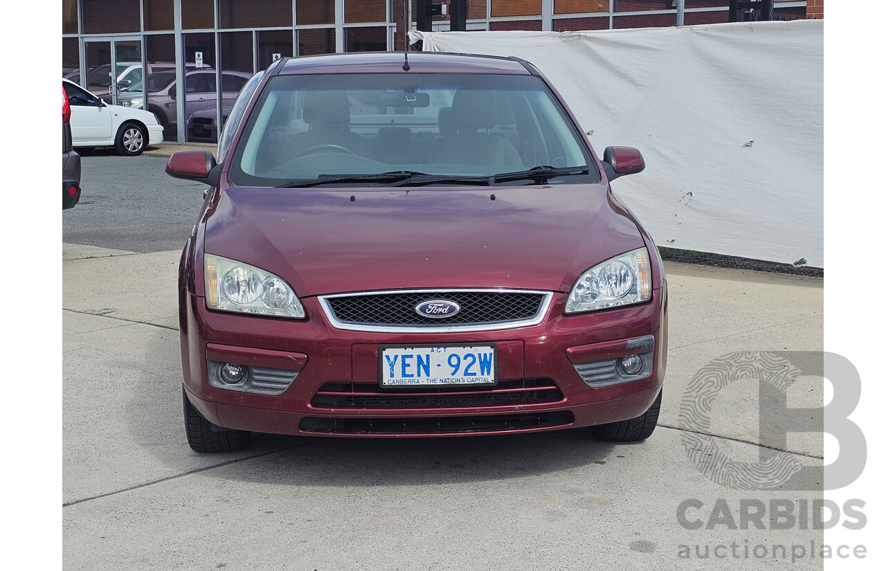 8/2006 Ford Focus GHIA LS 4d Sedan Red 2.0L