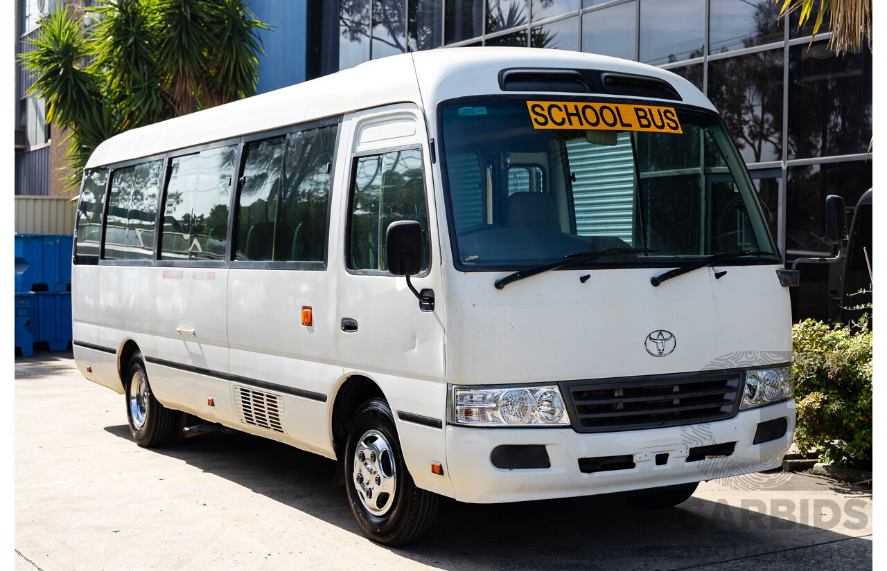 10/2012 Toyota Coaster LWB (4x2) XZB50R 07 Upgrade Bus White Turbo Diesel 4.0L - 21 Seater