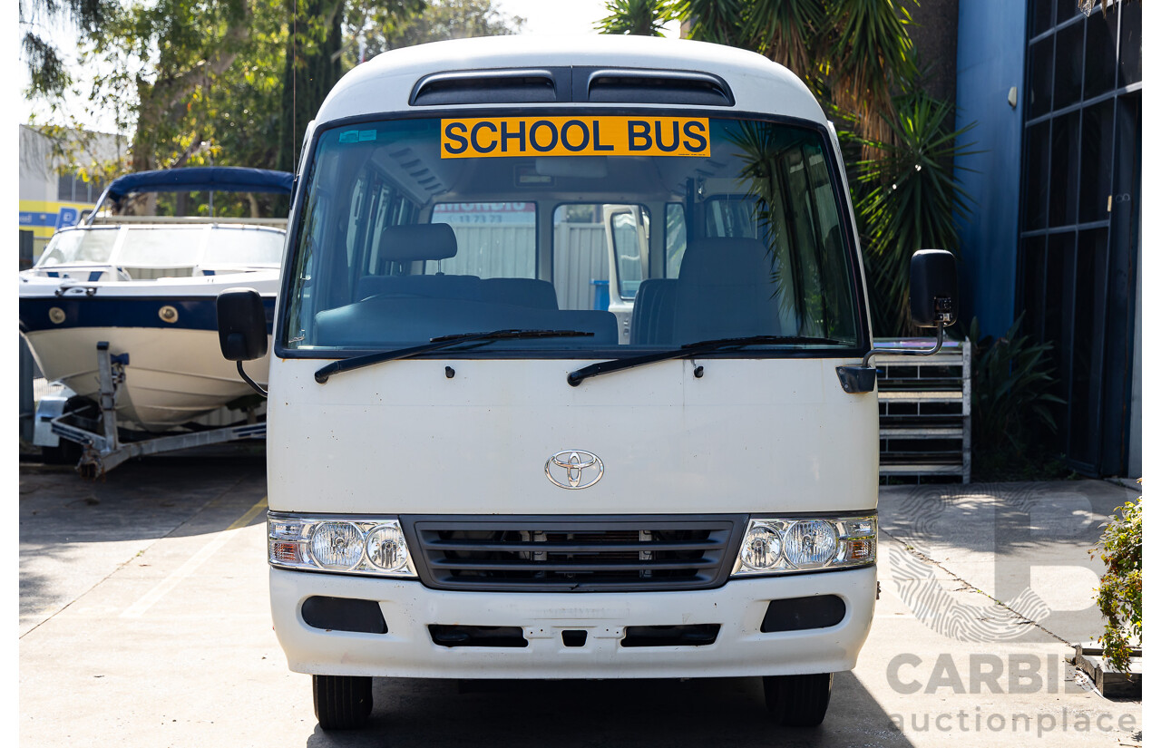 10/2012 Toyota Coaster LWB (4x2) XZB50R 07 Upgrade Bus White Turbo Diesel 4.0L - 21 Seater