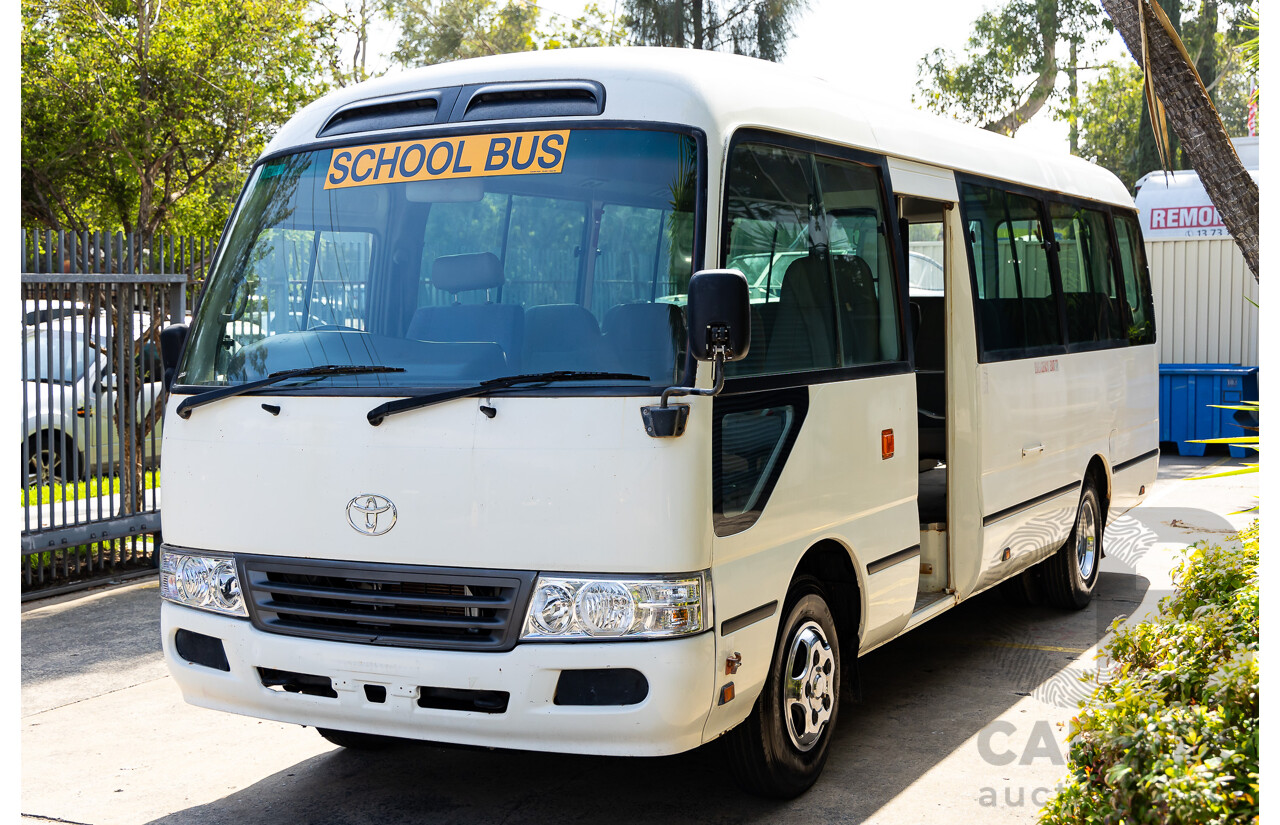 10/2012 Toyota Coaster LWB (4x2) XZB50R 07 Upgrade Bus White Turbo Diesel 4.0L - 21 Seater