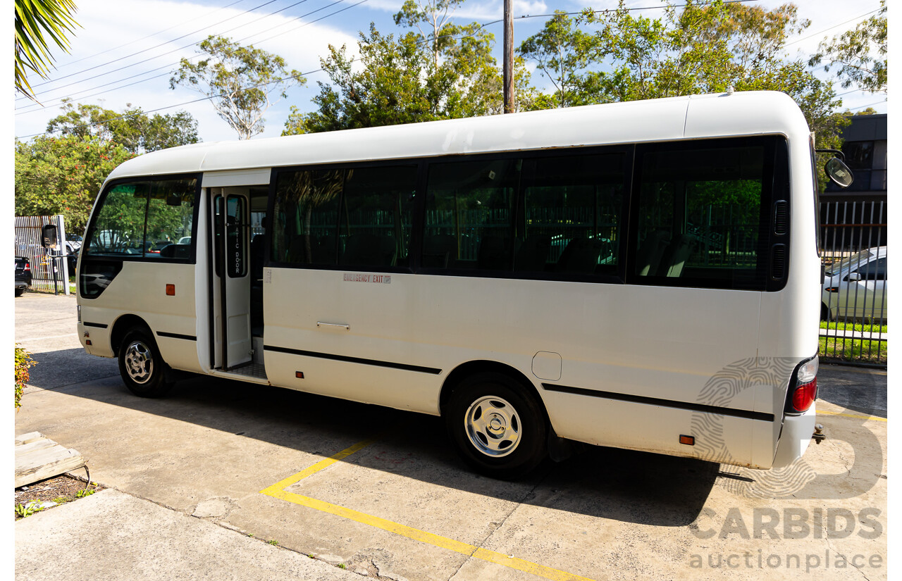 10/2012 Toyota Coaster LWB (4x2) XZB50R 07 Upgrade Bus White Turbo Diesel 4.0L - 21 Seater