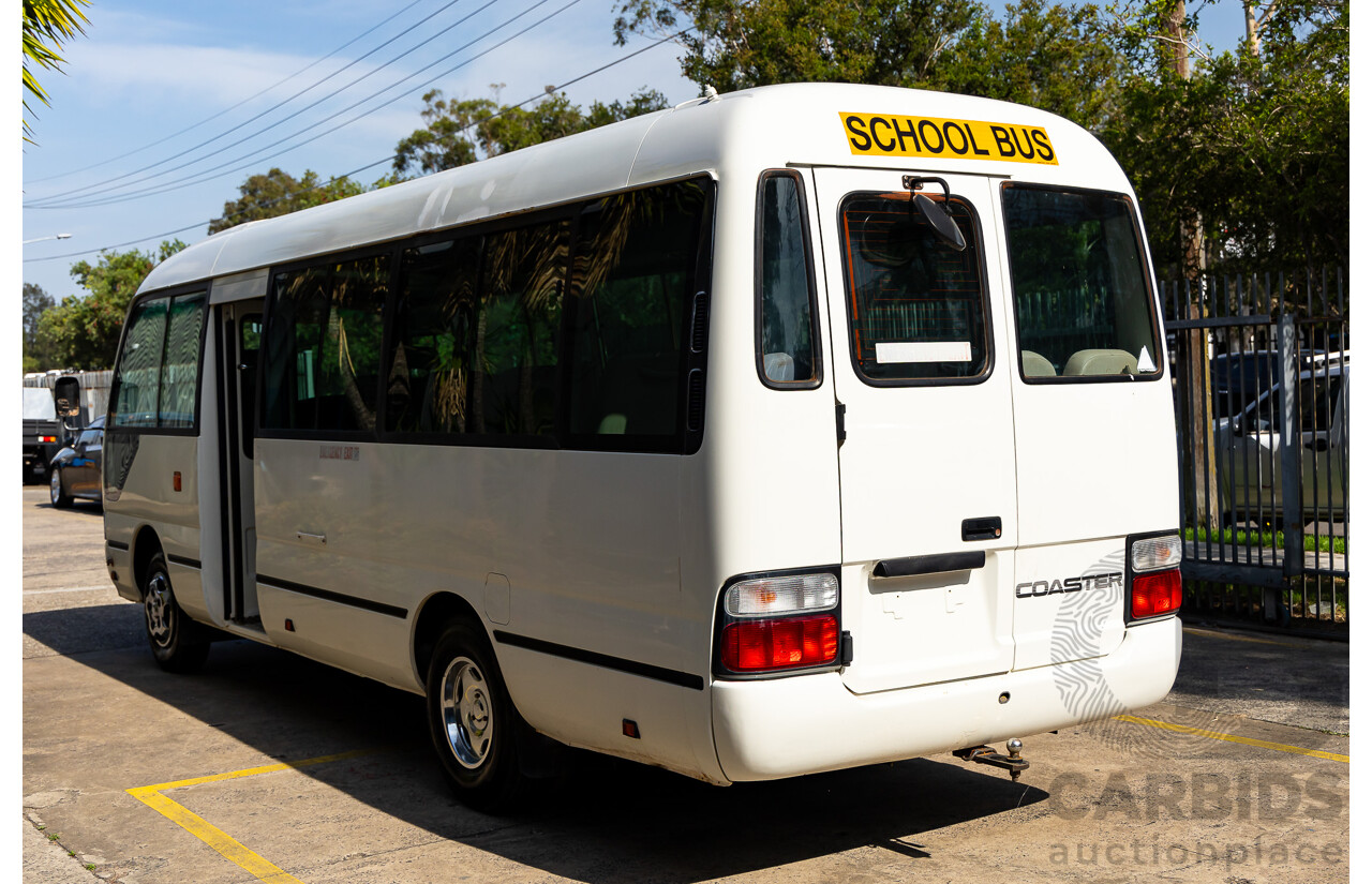 10/2012 Toyota Coaster LWB (4x2) XZB50R 07 Upgrade Bus White Turbo Diesel 4.0L - 21 Seater