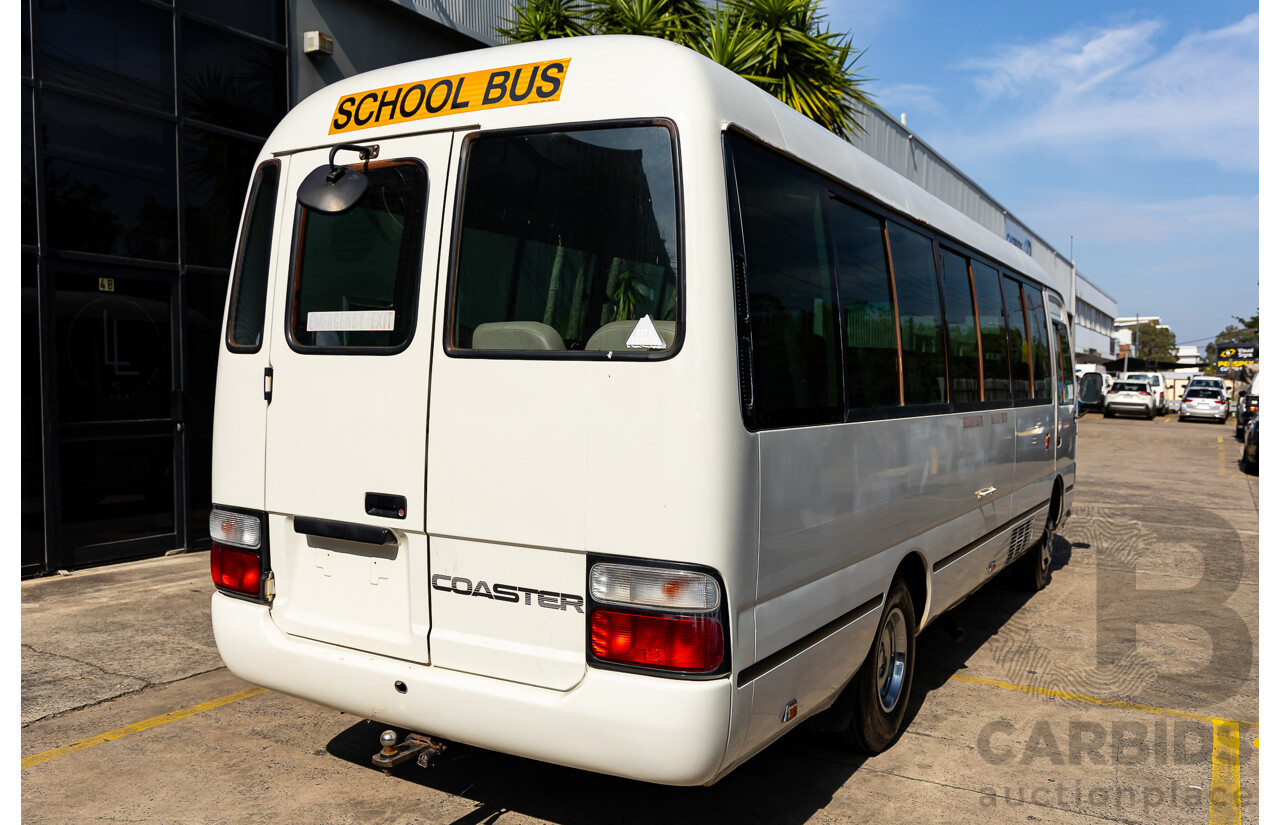 10/2012 Toyota Coaster LWB (4x2) XZB50R 07 Upgrade Bus White Turbo Diesel 4.0L - 21 Seater