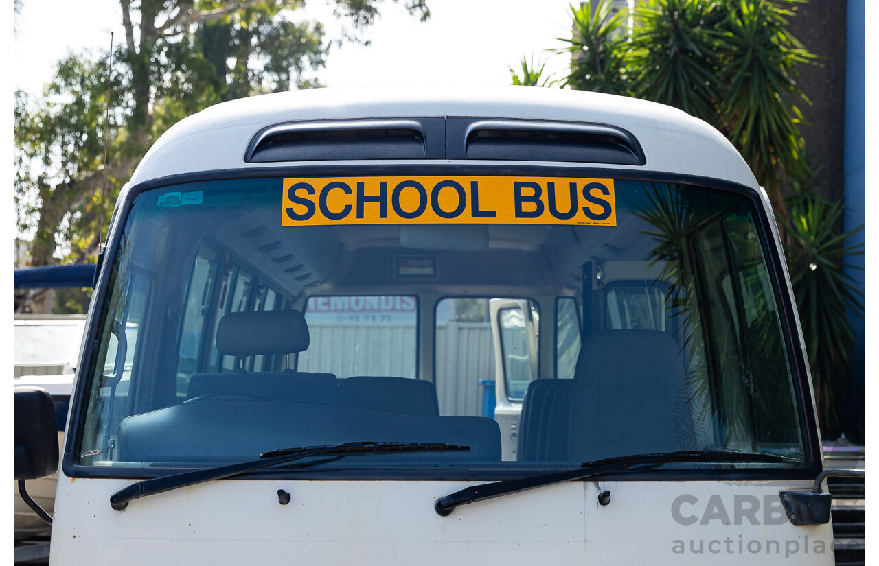 10/2012 Toyota Coaster LWB (4x2) XZB50R 07 Upgrade Bus White Turbo Diesel 4.0L - 21 Seater