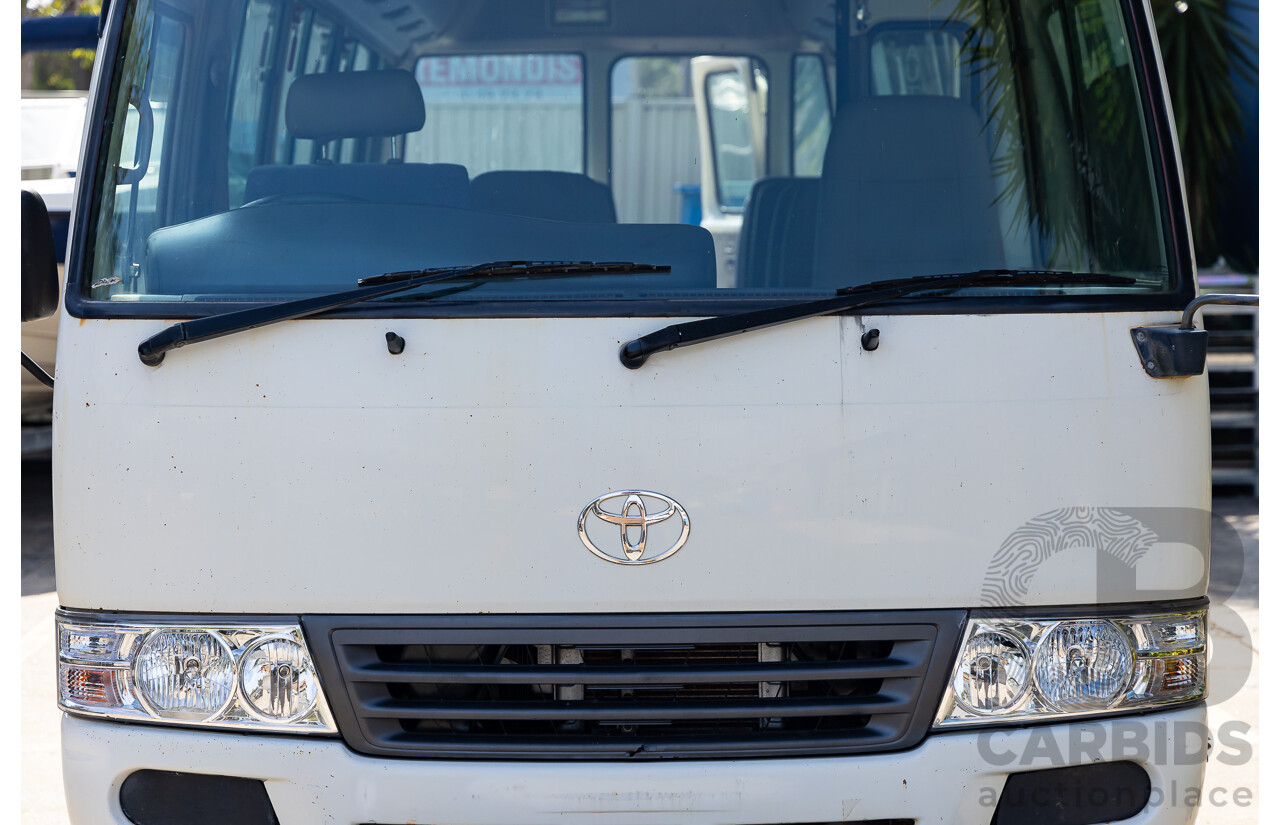 10/2012 Toyota Coaster LWB (4x2) XZB50R 07 Upgrade Bus White Turbo Diesel 4.0L - 21 Seater