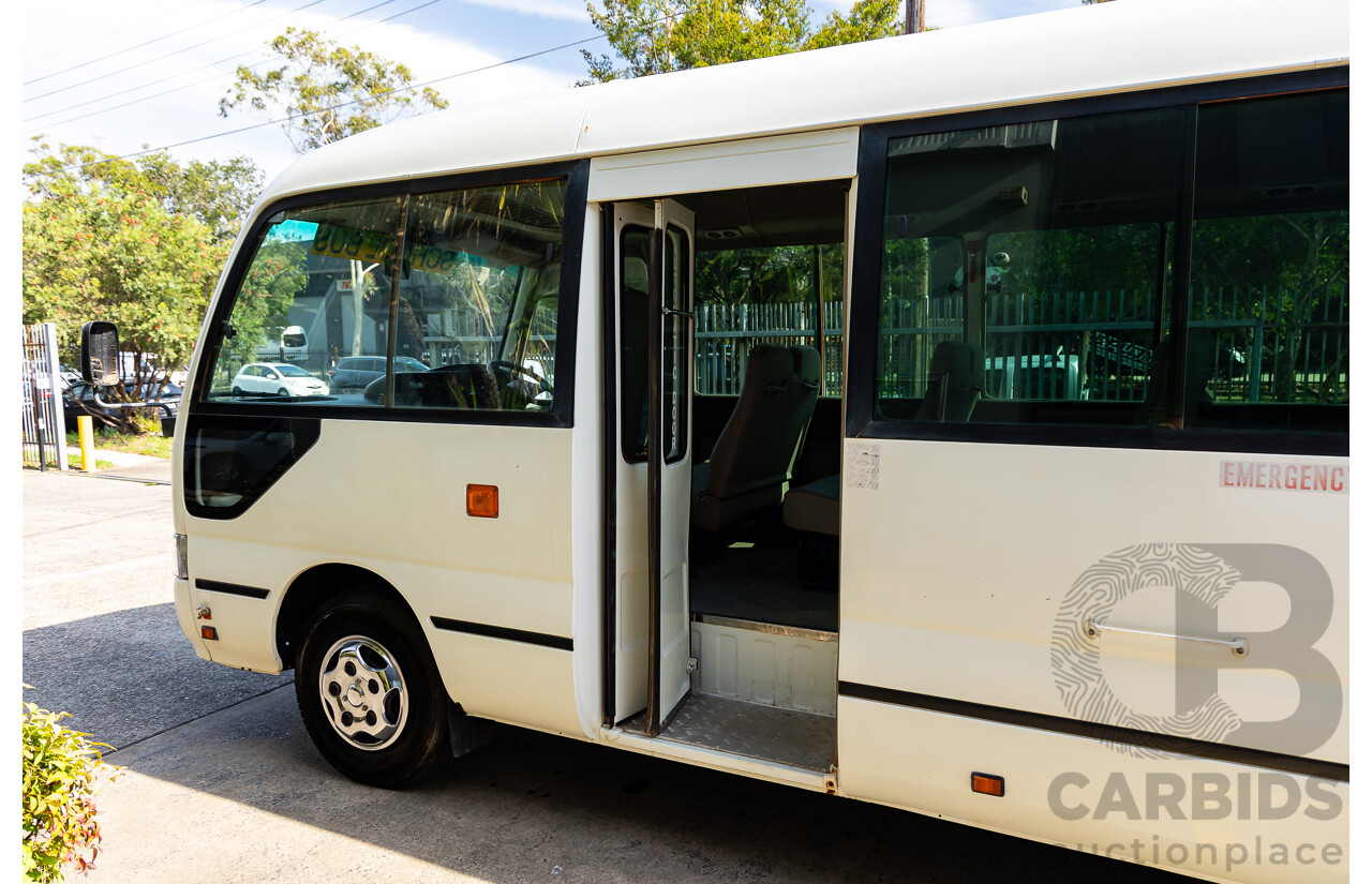 10/2012 Toyota Coaster LWB (4x2) XZB50R 07 Upgrade Bus White Turbo Diesel 4.0L - 21 Seater