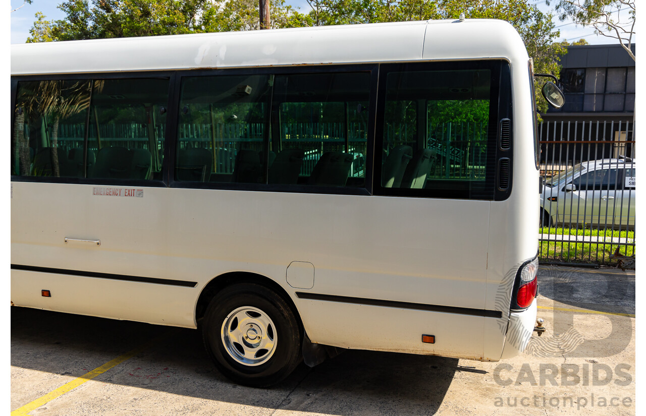 10/2012 Toyota Coaster LWB (4x2) XZB50R 07 Upgrade Bus White Turbo Diesel 4.0L - 21 Seater