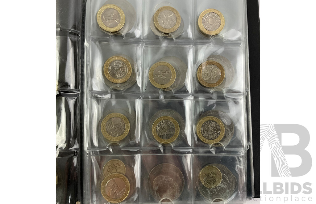 Collection of International Coins Including United Kingdom Commemorative One and Two Pound, Fifty Pence, Crowns, USA, Egypt