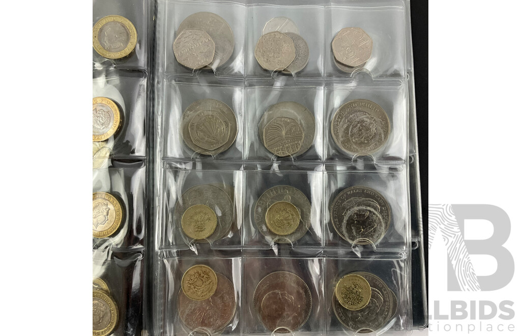 Collection of International Coins Including United Kingdom Commemorative One and Two Pound, Fifty Pence, Crowns, USA, Egypt