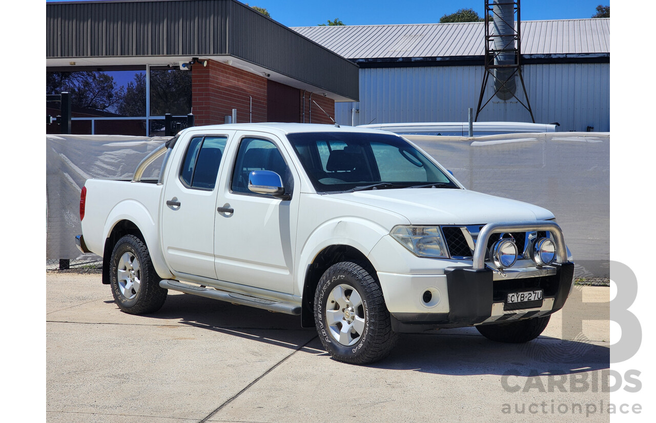 9/2009 Nissan Navara ST-X (4x4) D40 Dual Cab P/Up White 2.5L