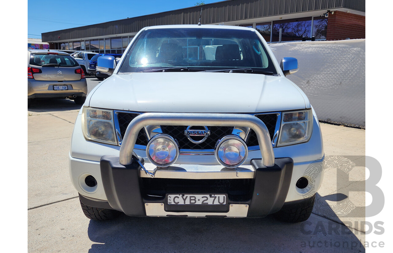 9/2009 Nissan Navara ST-X (4x4) D40 Dual Cab P/Up White 2.5L