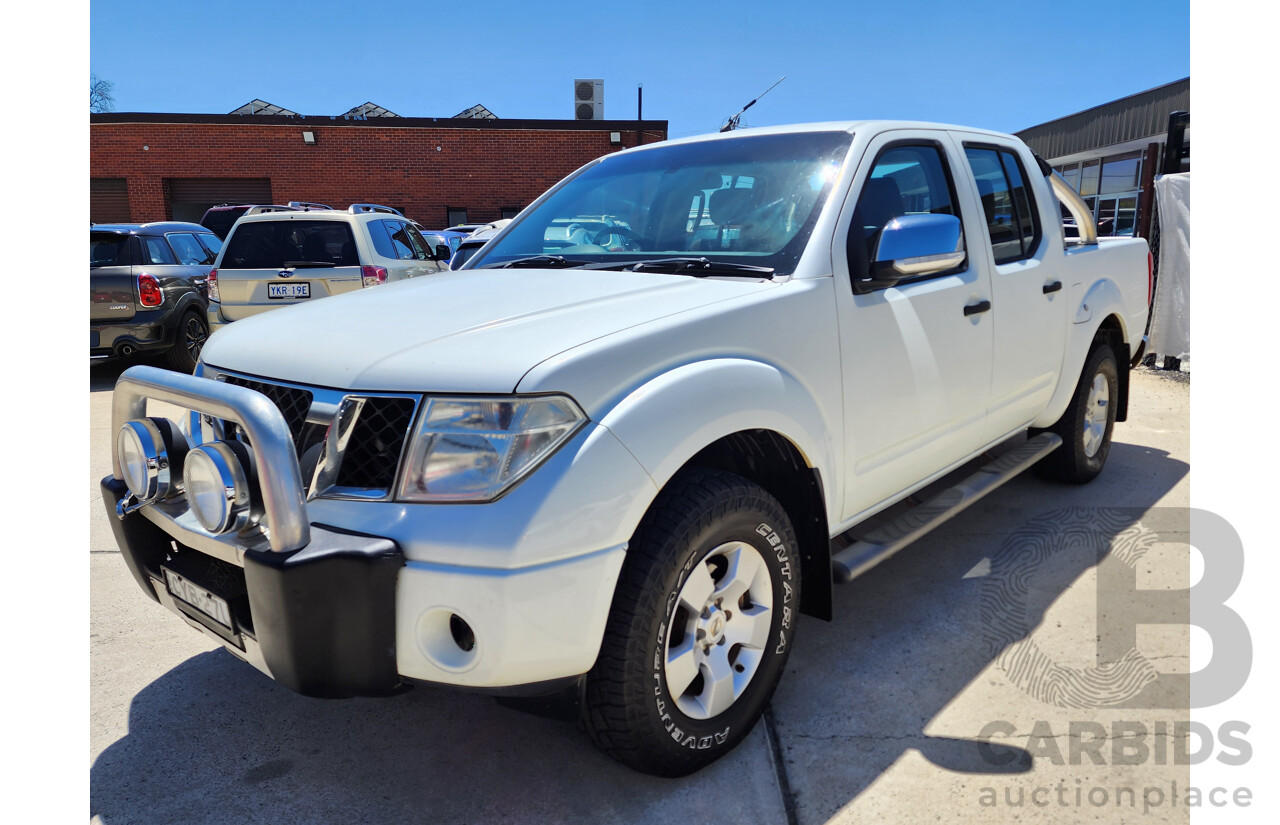 9/2009 Nissan Navara ST-X (4x4) D40 Dual Cab P/Up White 2.5L