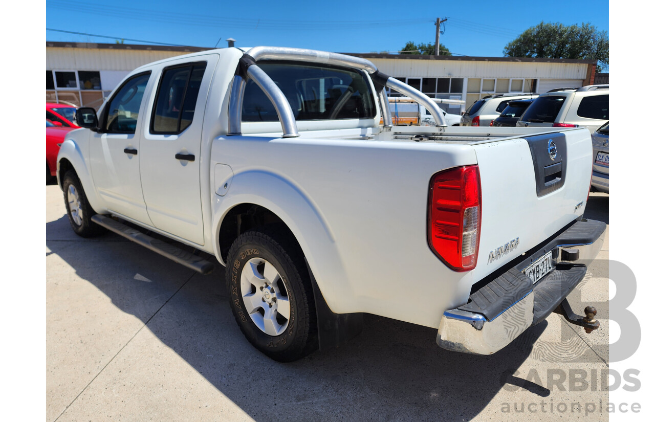 9/2009 Nissan Navara ST-X (4x4) D40 Dual Cab P/Up White 2.5L