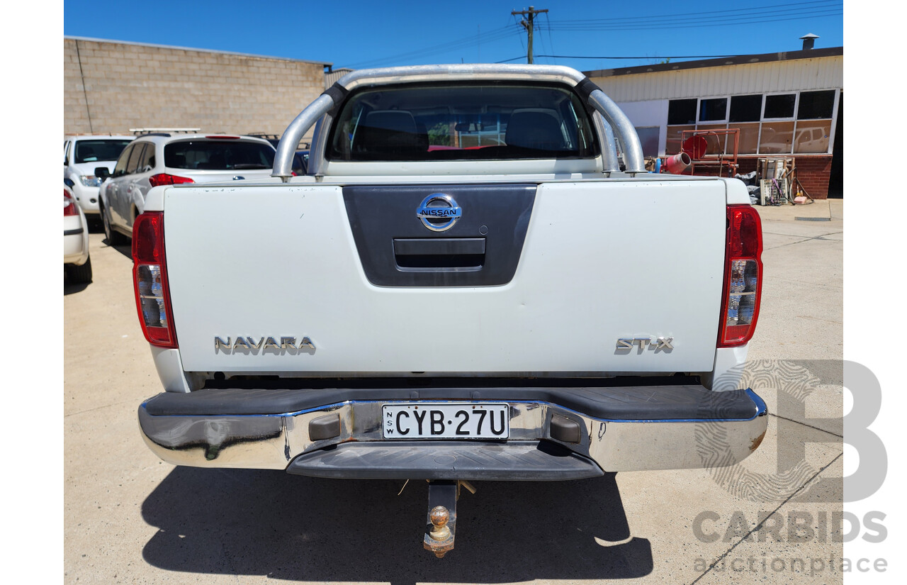 9/2009 Nissan Navara ST-X (4x4) D40 Dual Cab P/Up White 2.5L