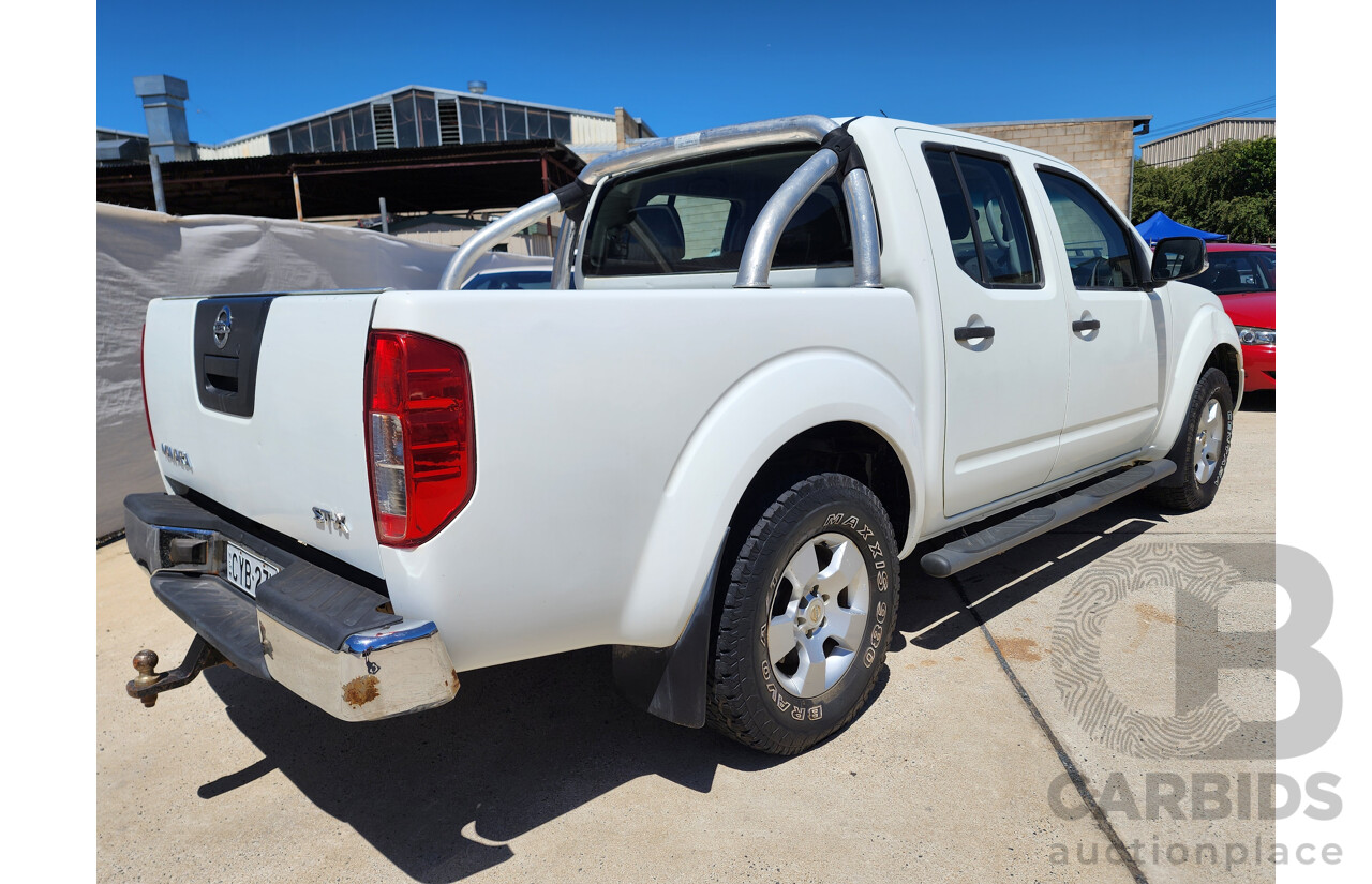 9/2009 Nissan Navara ST-X (4x4) D40 Dual Cab P/Up White 2.5L