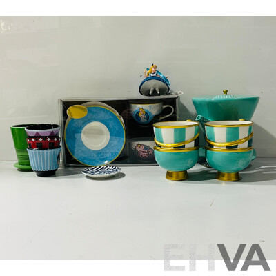 Collection of Alice in Wonderland Tea Cups and Related Items Including Alice in Wonderland Teacup Set, Mad Hatter Kettle and More