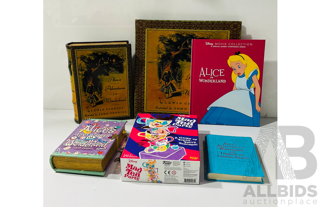 Collection of Books and Board Games Related to Alice in Wonderland