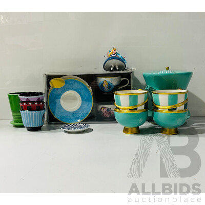 Collection of Alice in Wonderland Tea Cups and Related Items Including Alice in Wonderland Teacup Set, Mad Hatter Kettle and More