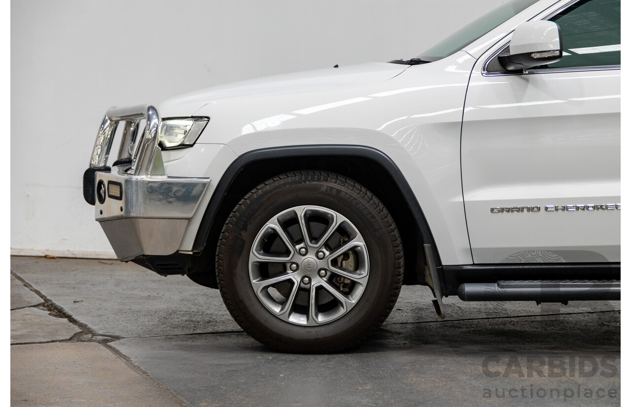 10/2014 Jeep Grand Cherokee Laredo (4x4) WK MY15 4d Wagon Bright White 3.0L Turbo Diesel