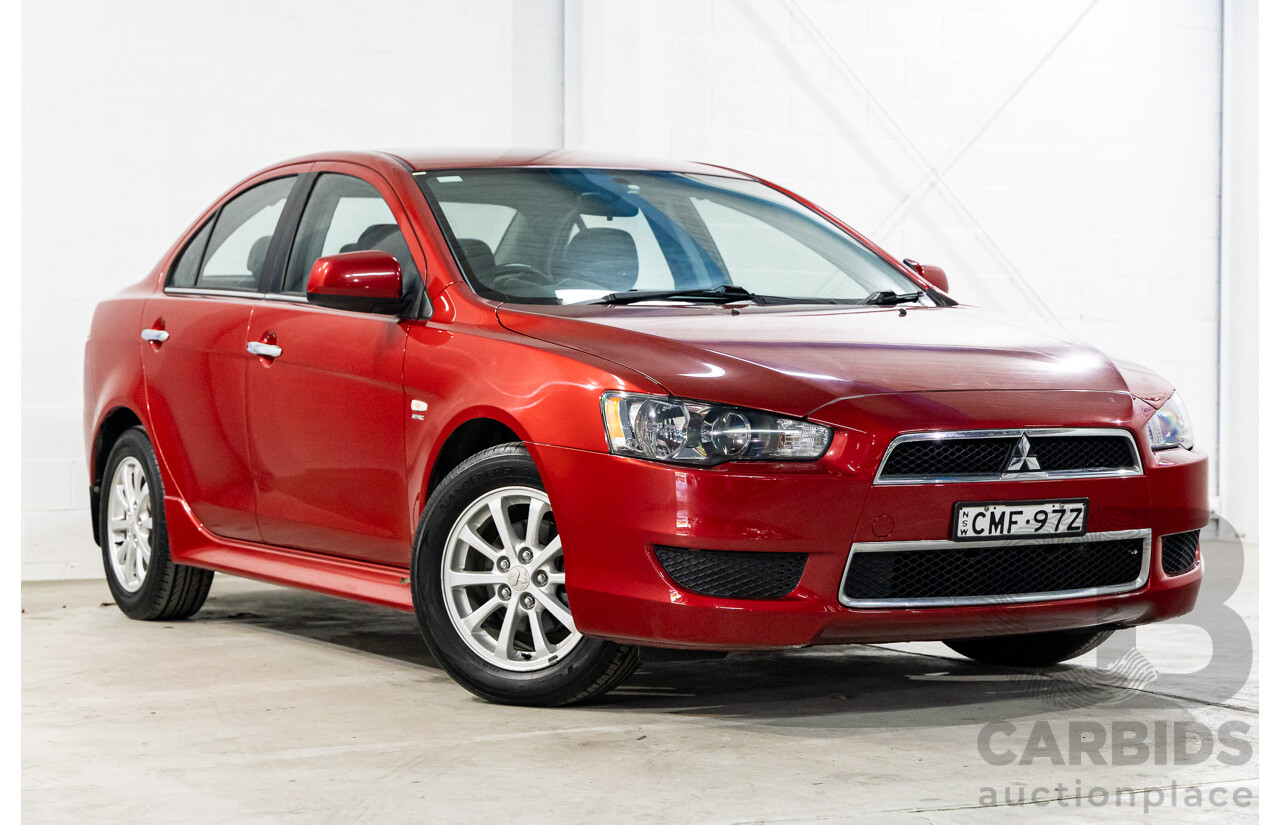 1/2013 Mitsubishi Lancer LX CJ MY13 4d Sedan Red Metallic 2.0L