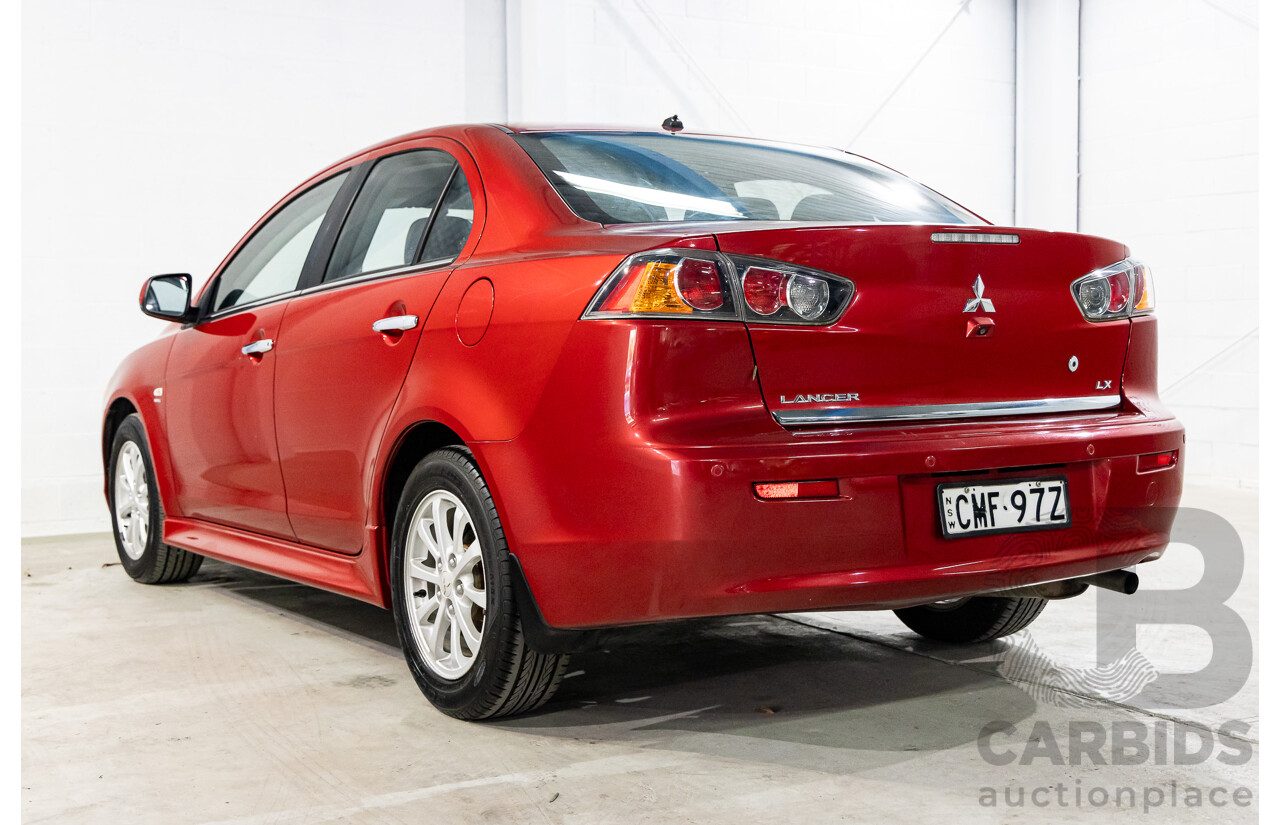 1/2013 Mitsubishi Lancer LX CJ MY13 4d Sedan Red Metallic 2.0L