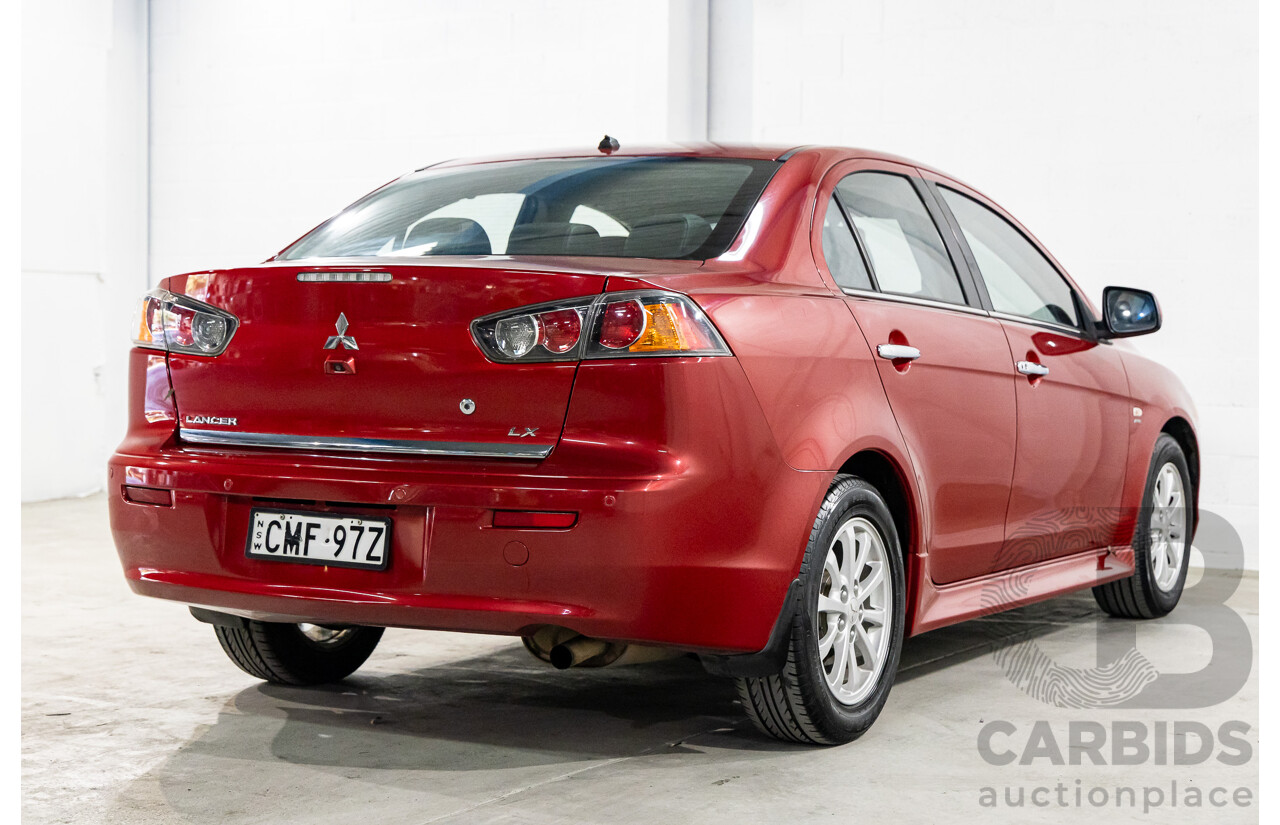 1/2013 Mitsubishi Lancer LX CJ MY13 4d Sedan Red Metallic 2.0L