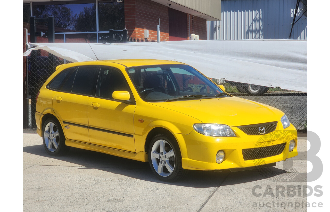 10/2002 Mazda 323 Astina SP20  5d Hatchback Yellow 2.0L