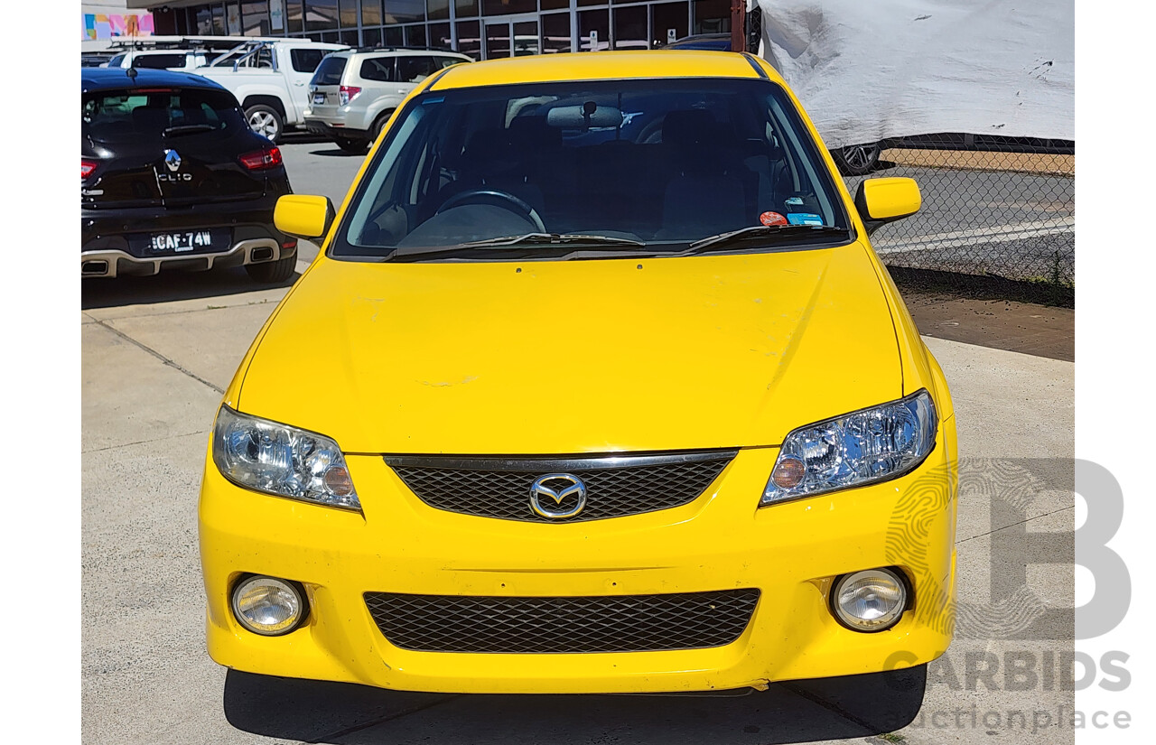 10/2002 Mazda 323 Astina SP20  5d Hatchback Yellow 2.0L