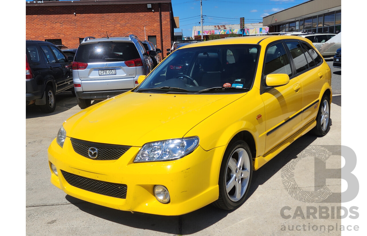 10/2002 Mazda 323 Astina SP20  5d Hatchback Yellow 2.0L